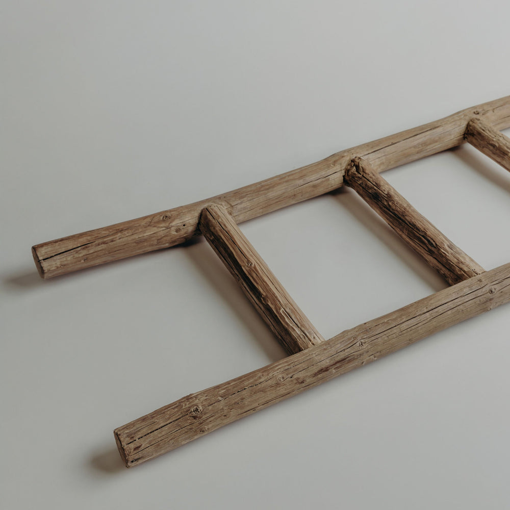 wooden ladder on floor