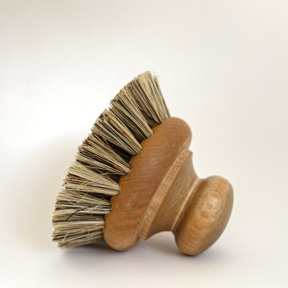 Tough Pan Brush on its side showing the dense union fibre bristles